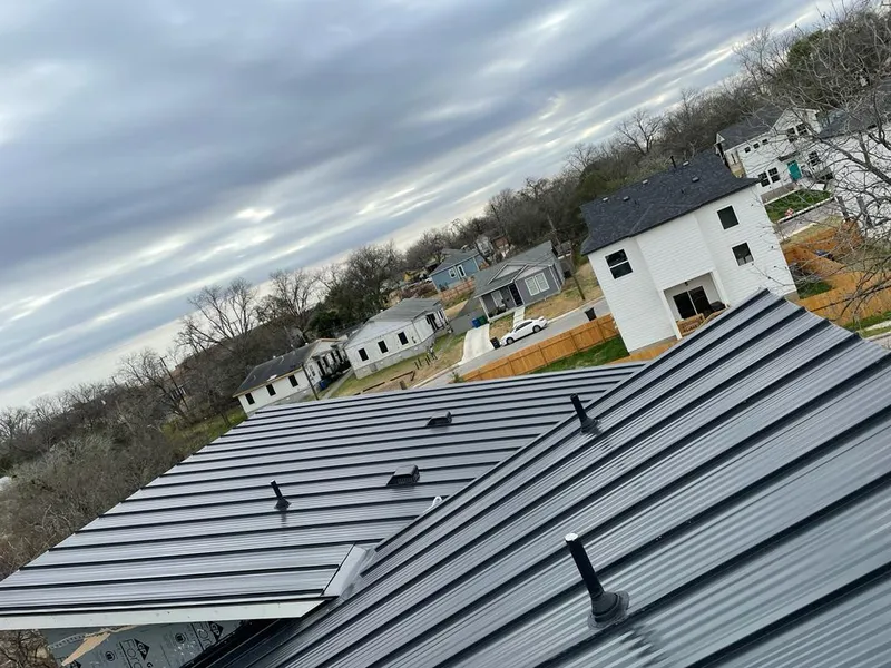 Standing seam metal roof panels with vents for Skylight Repair in Pocono